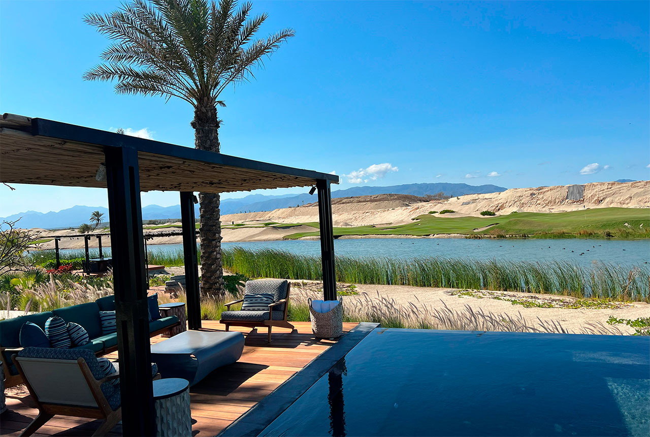 A view from the Four Seasons beach club taken in 2022 across a marina inlet and the golf course towards yet to be developed Costa Palmas residential lots.